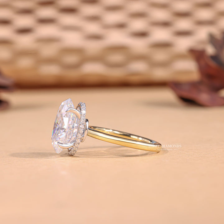 Oval hidden halo lab grown diamond ring side profile in gold setting