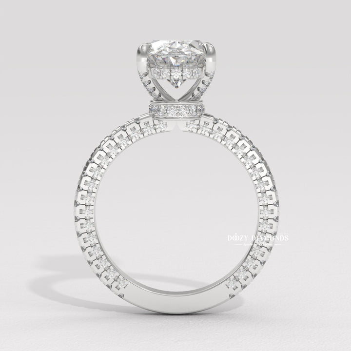 Oval cut engagement ring side view showing band detail