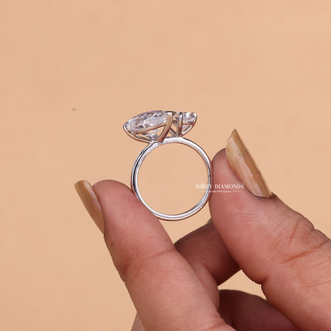 Pear cut engagement ring side view showing band detail