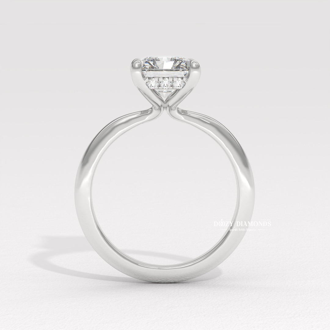 Profile view of radiant cut hidden halo engagement ring band