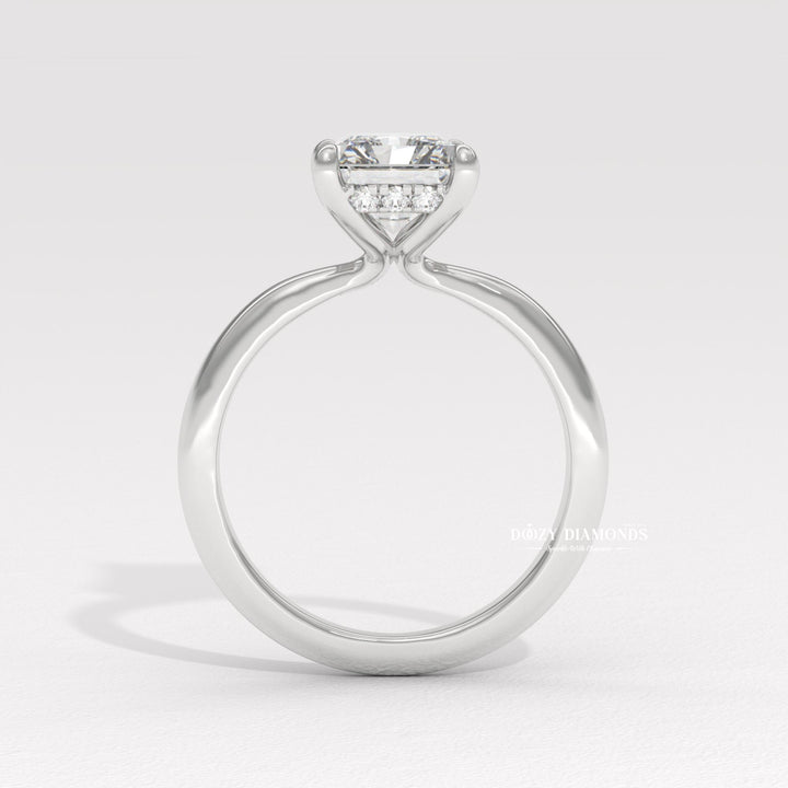Profile view of radiant cut hidden halo engagement ring band