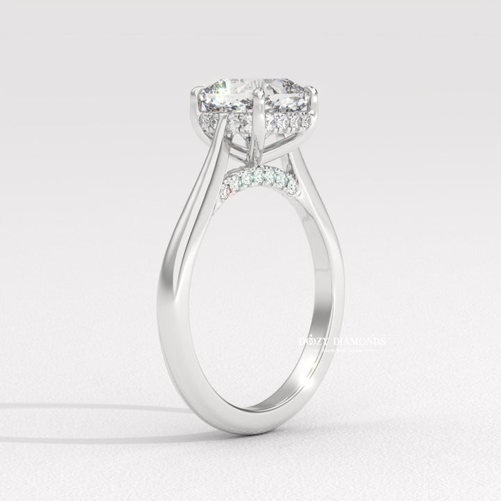 Certified cushion cut diamond featured in solitaire engagement ring