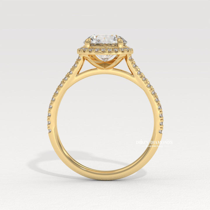 Macro shot of round cut diamond facets in halo ring setting