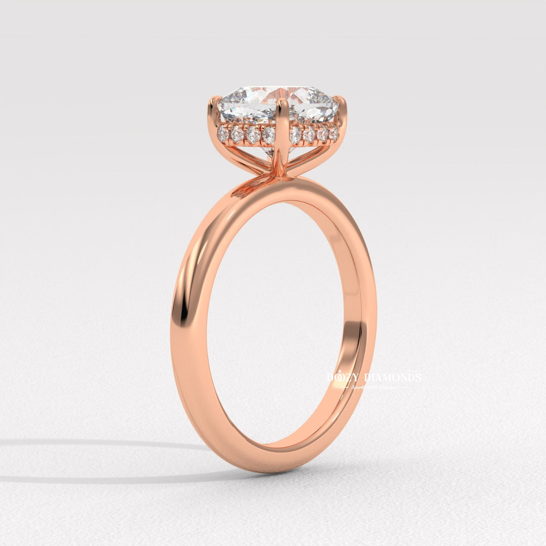 Lifestyle shot of cushion hidden halo diamond ring on hand