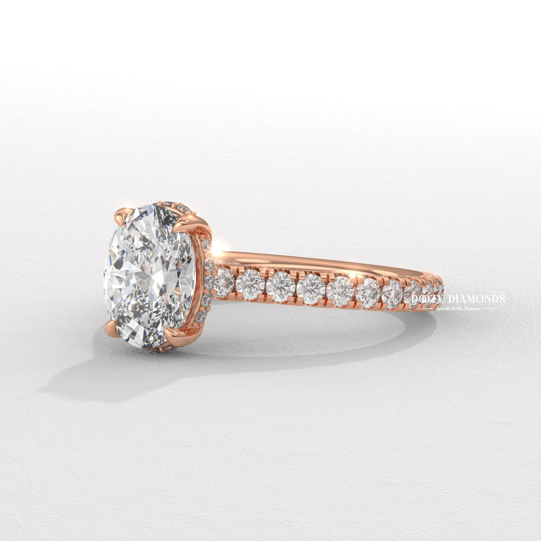 Oval halo engagement ring shown on hand for true-to-life sizing