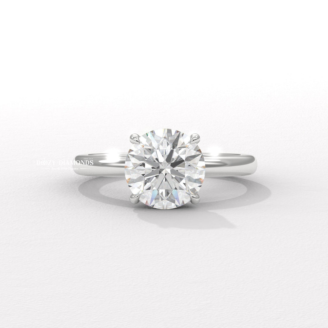 Angled view of round cut diamond in hidden halo setting