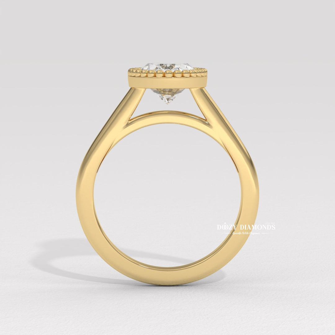 Top-down view of oval cut bezel engagement ring