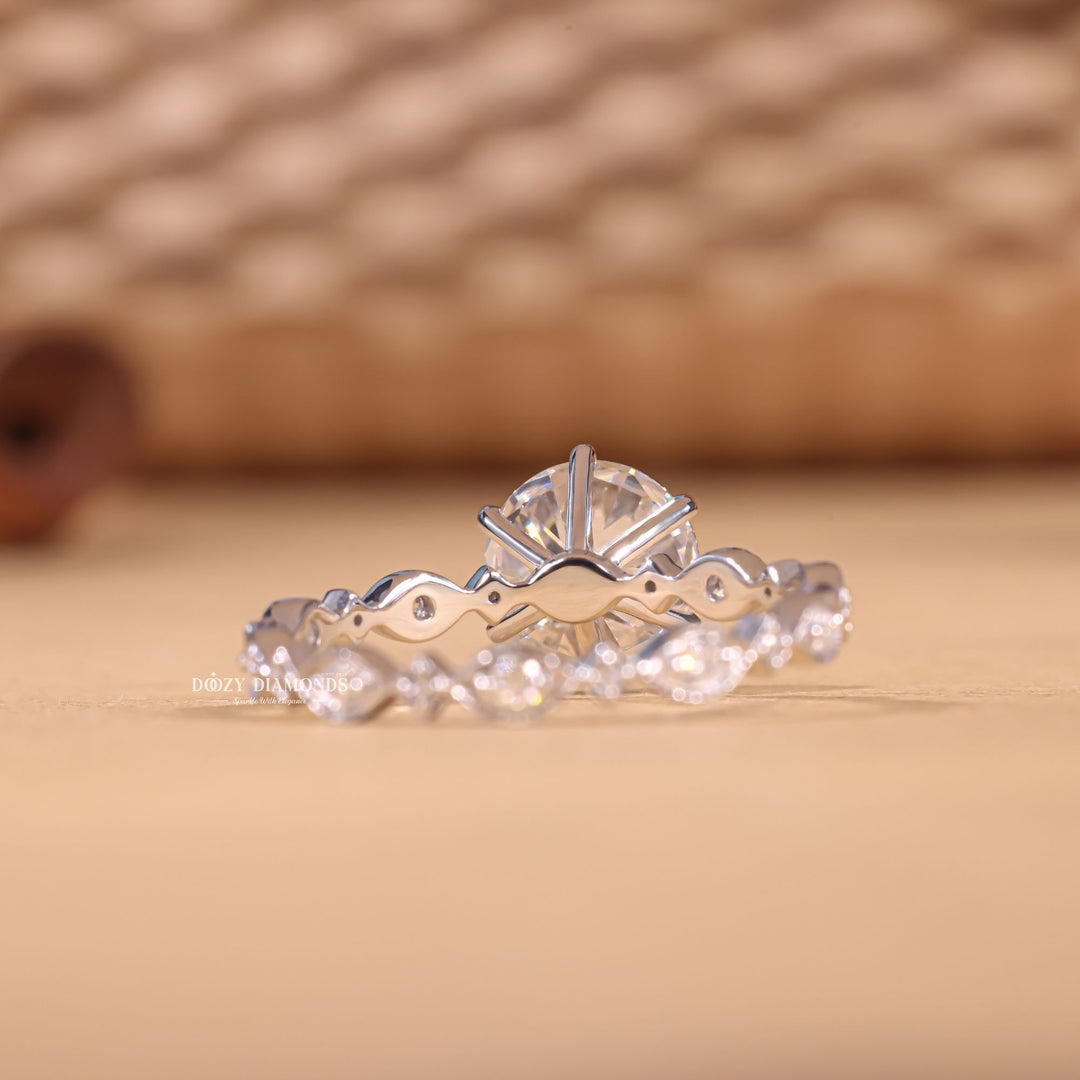Round cut diamond ring worn on hand