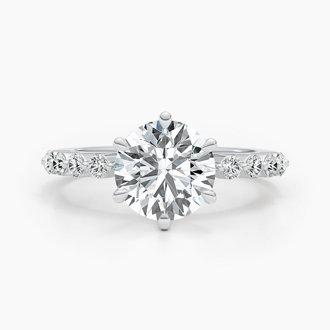 Round pave diamond ring presented in signature gift packaging
