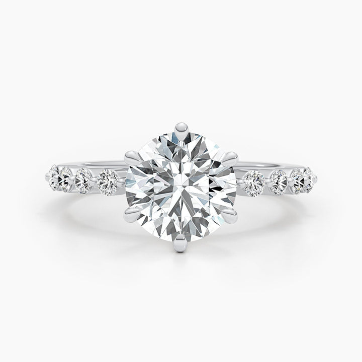 Round pave diamond ring presented in signature gift packaging