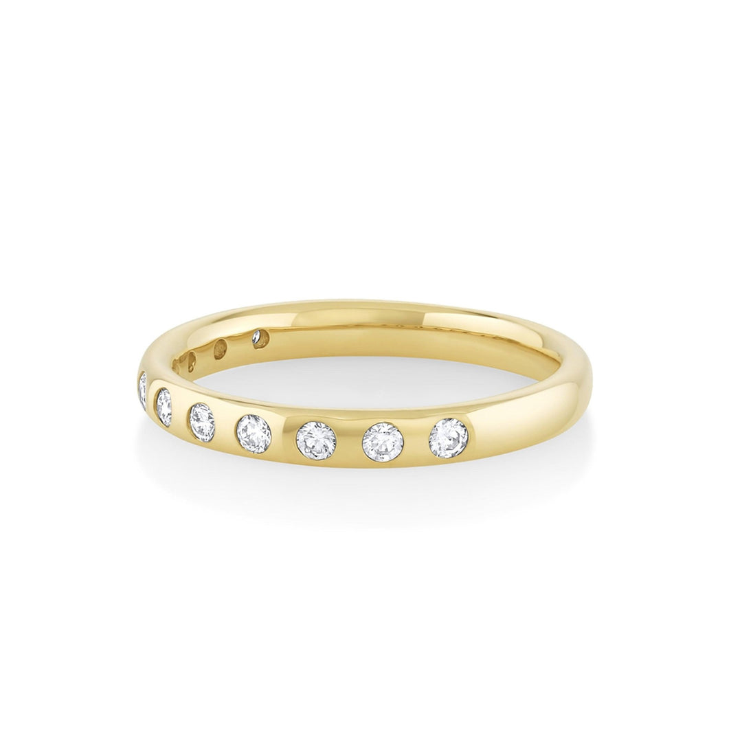 Round diamond band stacked with engagement ring