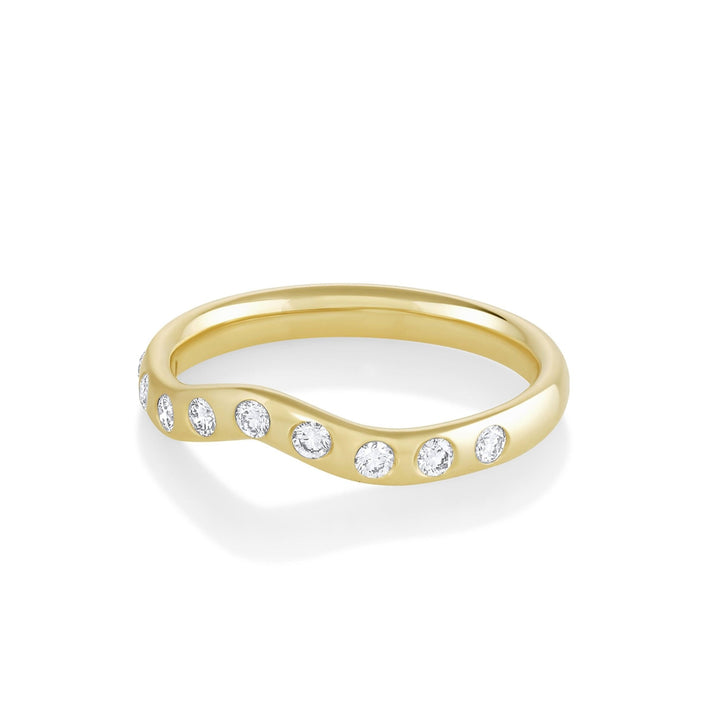Round diamond band stacked with engagement ring