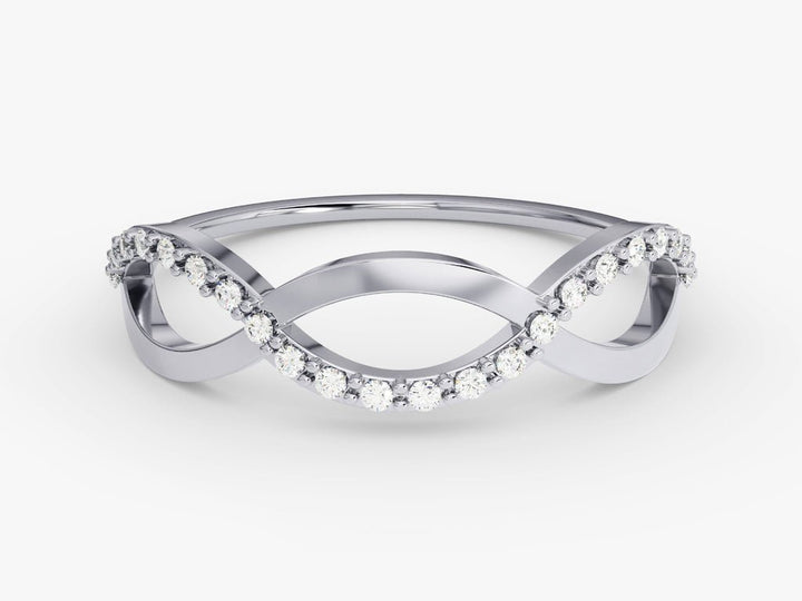Round diamond band stacked with engagement ring