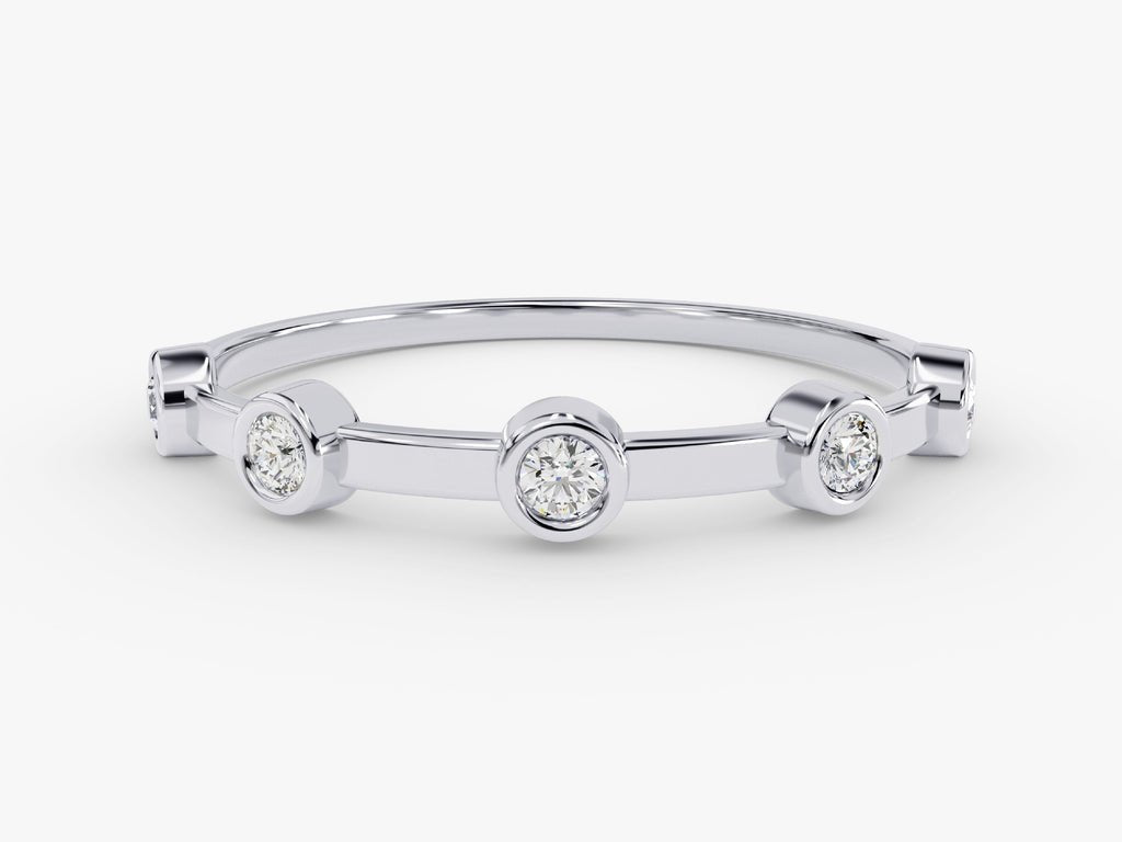 Round diamond band stacked with engagement ring