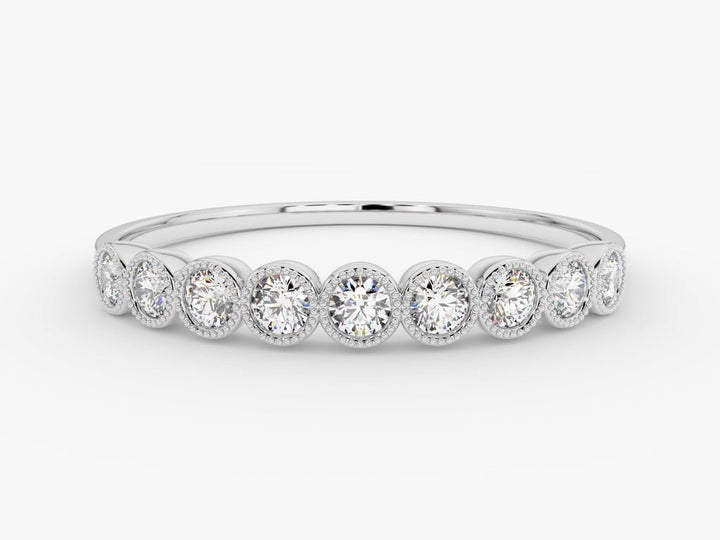 Round diamond band stacked with engagement ring