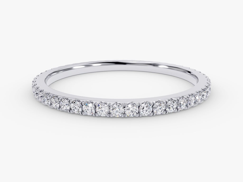 Round diamond band stacked with engagement ring