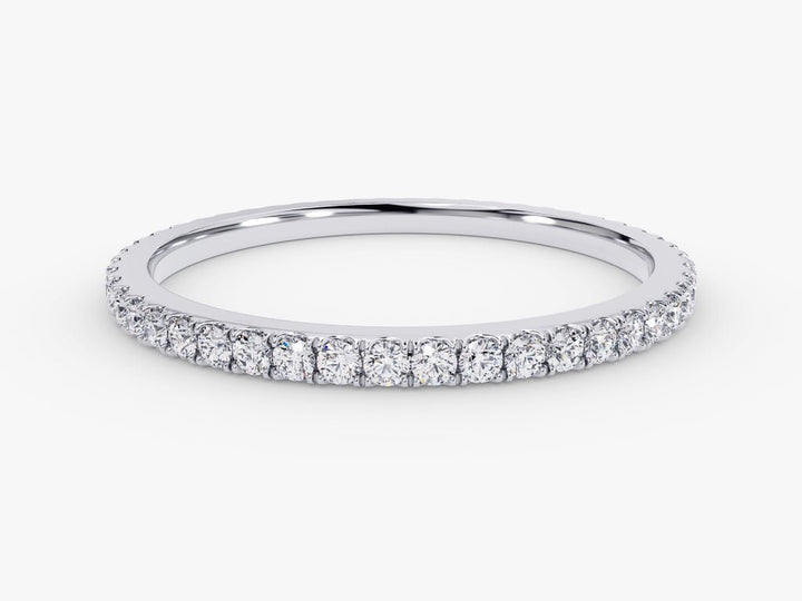 Round diamond band stacked with engagement ring