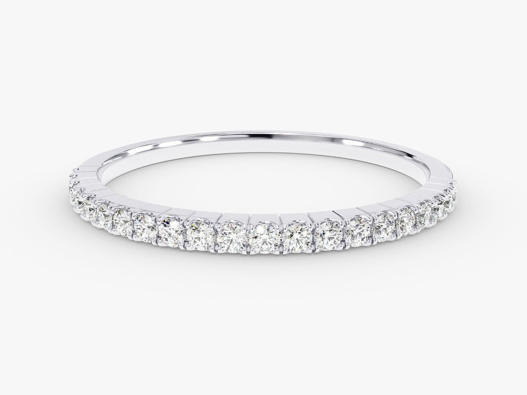 Round diamond band stacked with engagement ring