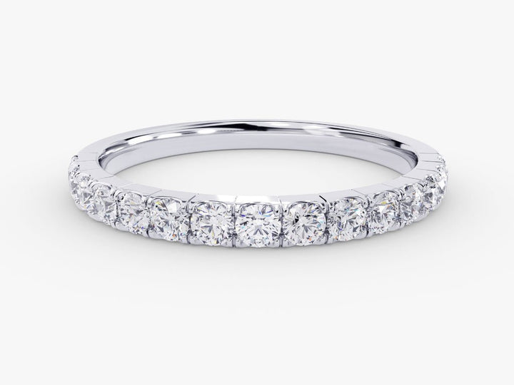 Round diamond band stacked with engagement ring
