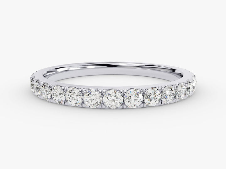 Round diamond band stacked with engagement ring