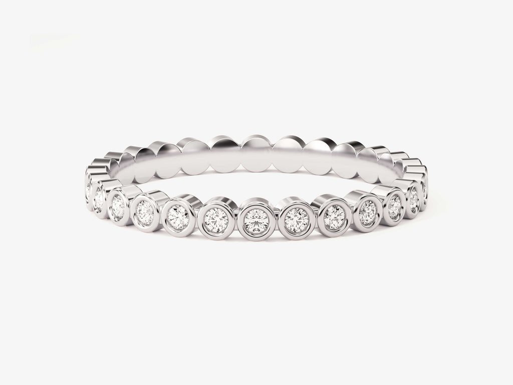 Round diamond band stacked with engagement ring