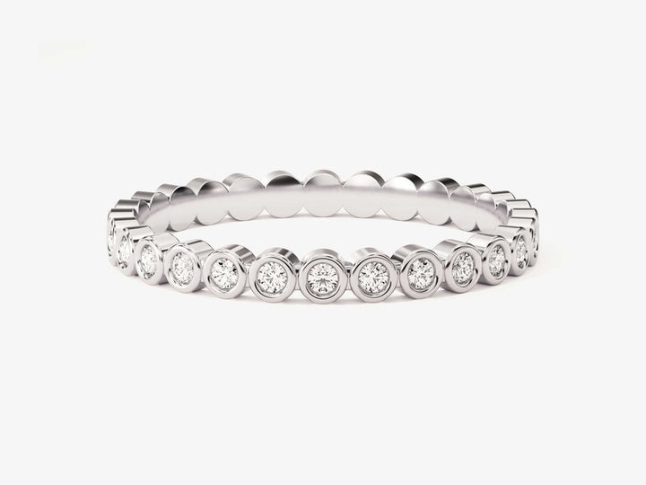 Round diamond band stacked with engagement ring