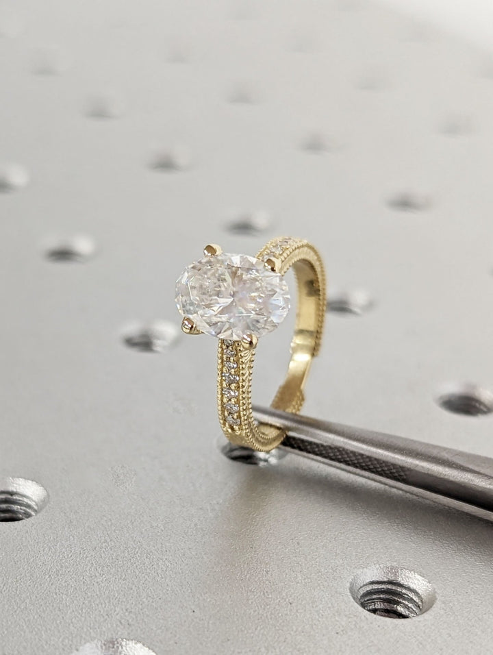 Oval cut vintage engagement ring shown in real-life wear