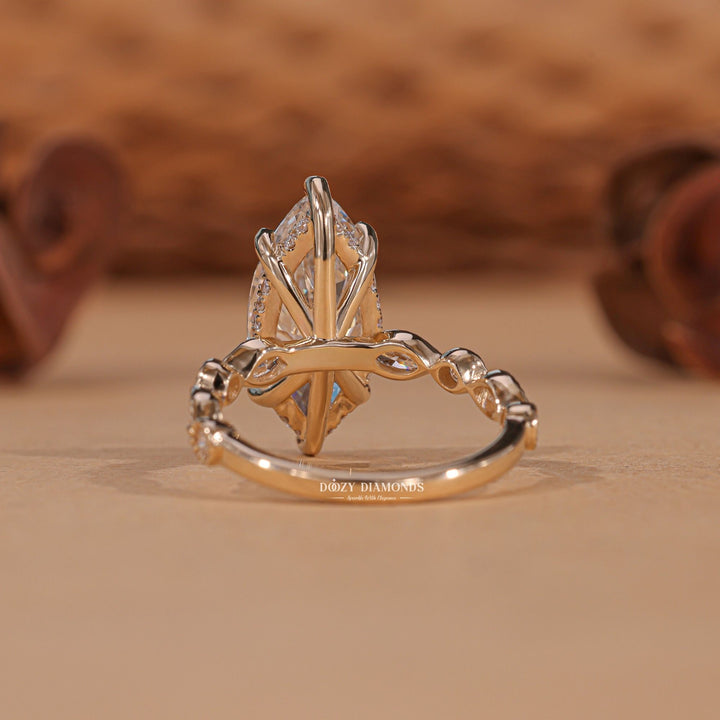 Macro shot of marquise cut diamond facets in vintage ring setting