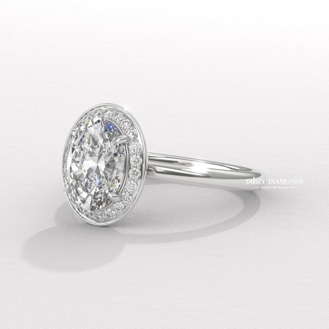 Oval cut engagement ring shown with authenticity certificate