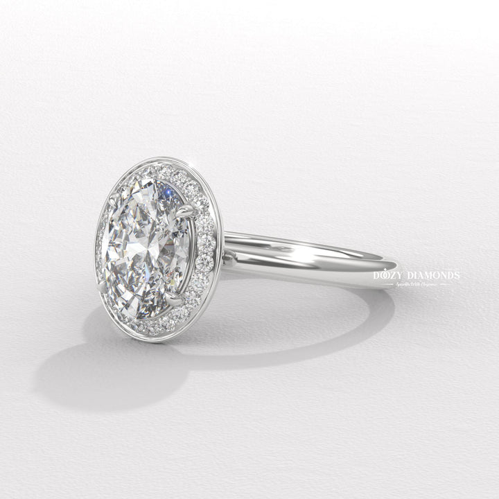 Oval cut engagement ring shown with authenticity certificate