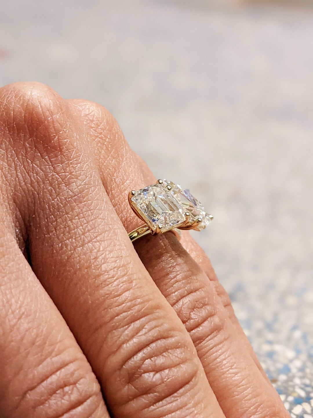Pear cut diamond ring worn on hand