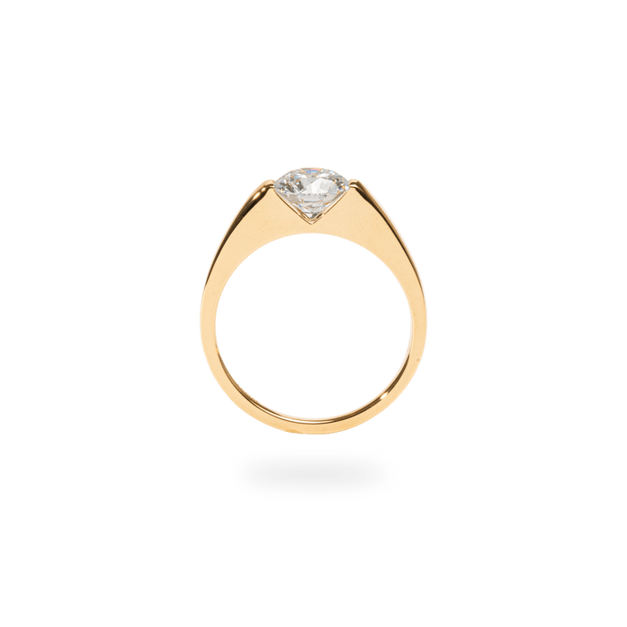 Round cut solitaire engagement ring shown in real-life wear