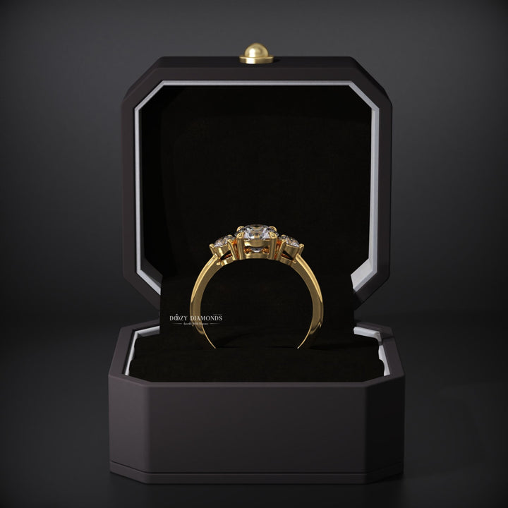 Side angle of round three stone diamond engagement ring