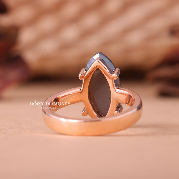 Macro shot of marquise cut diamond facets in solitaire ring setting