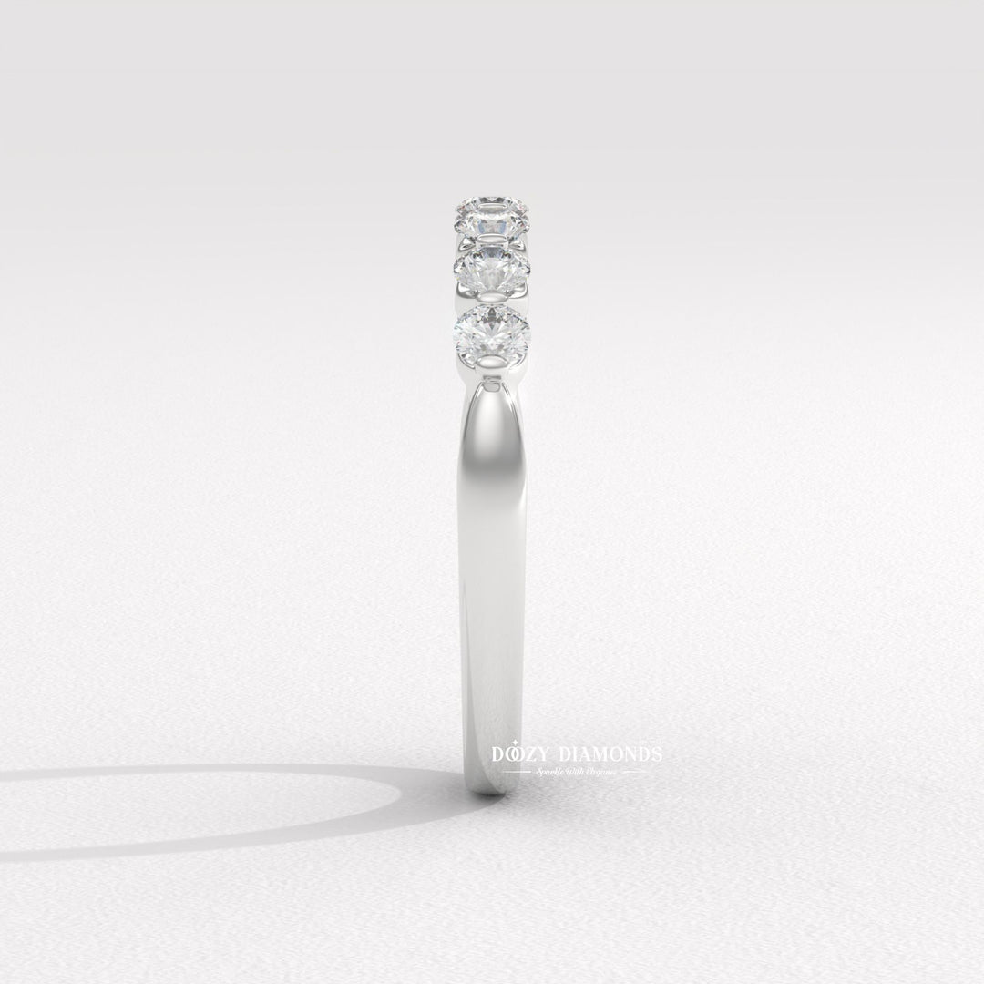 Side view of round diamond wedding band