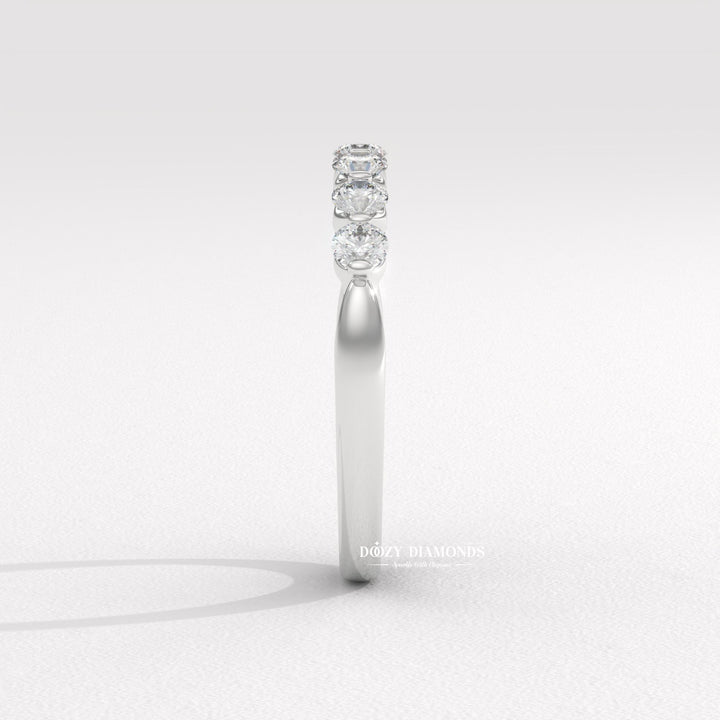 Side view of round diamond wedding band