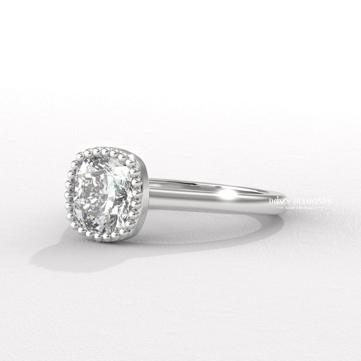 Classic cushion bezel engagement ring crafted for everyday wear