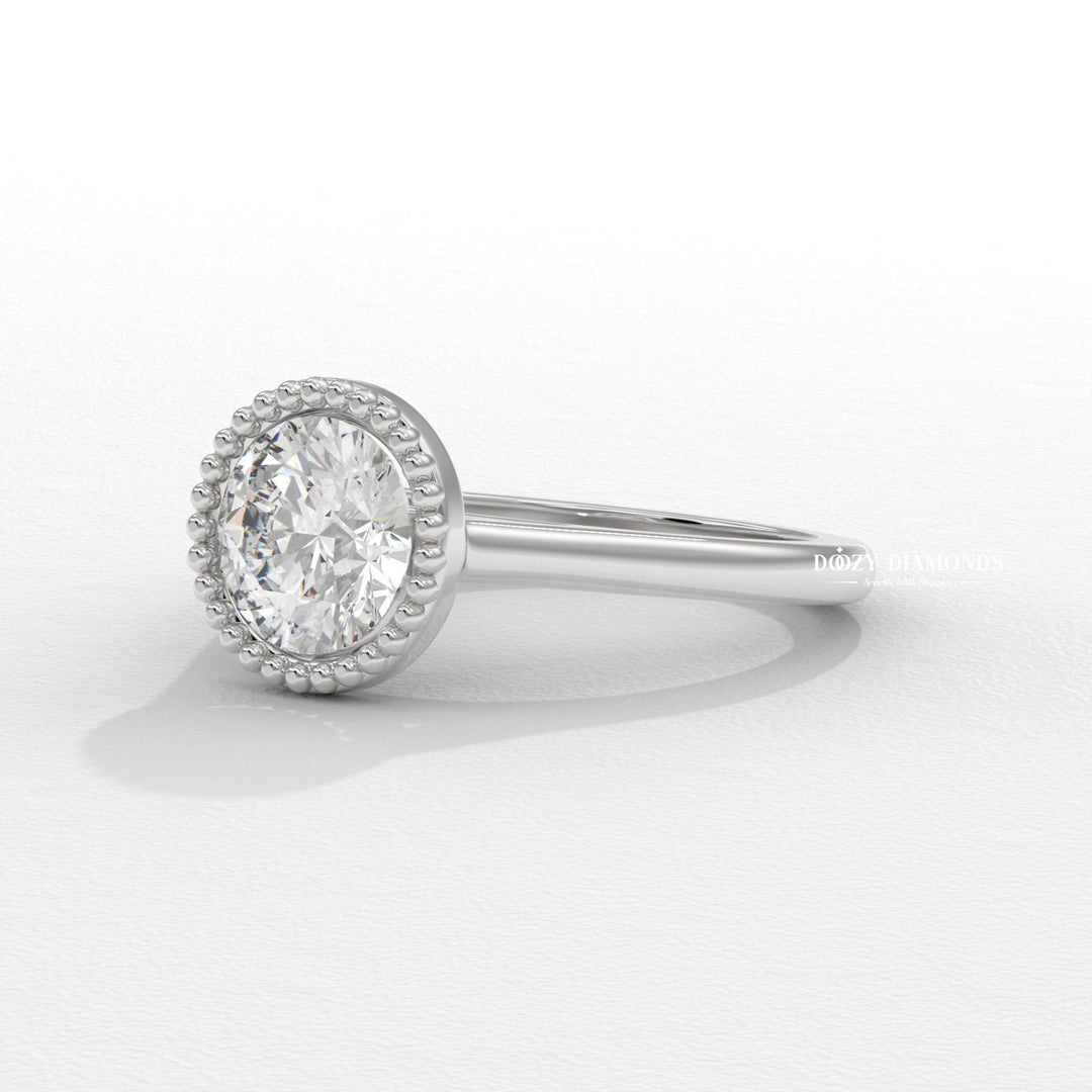 Round cut diamond ring worn on hand
