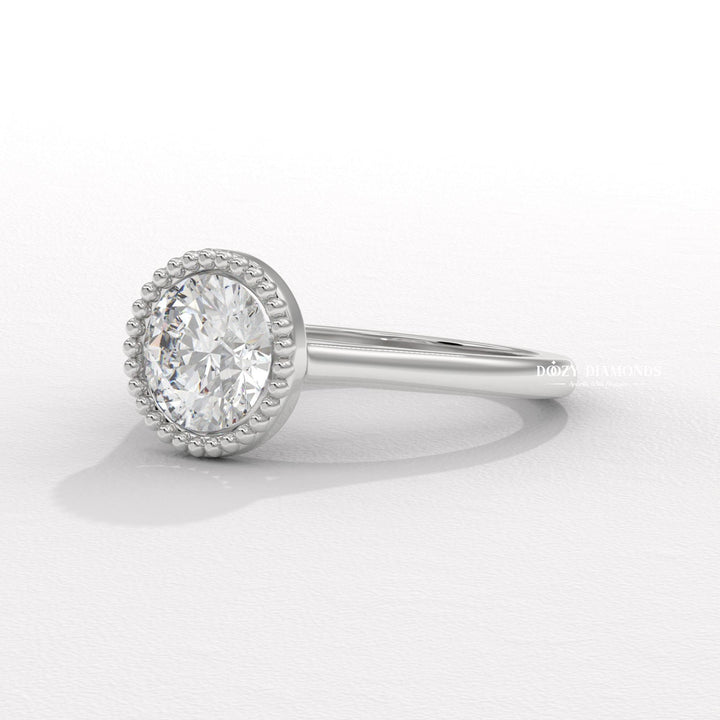 Round cut diamond ring worn on hand