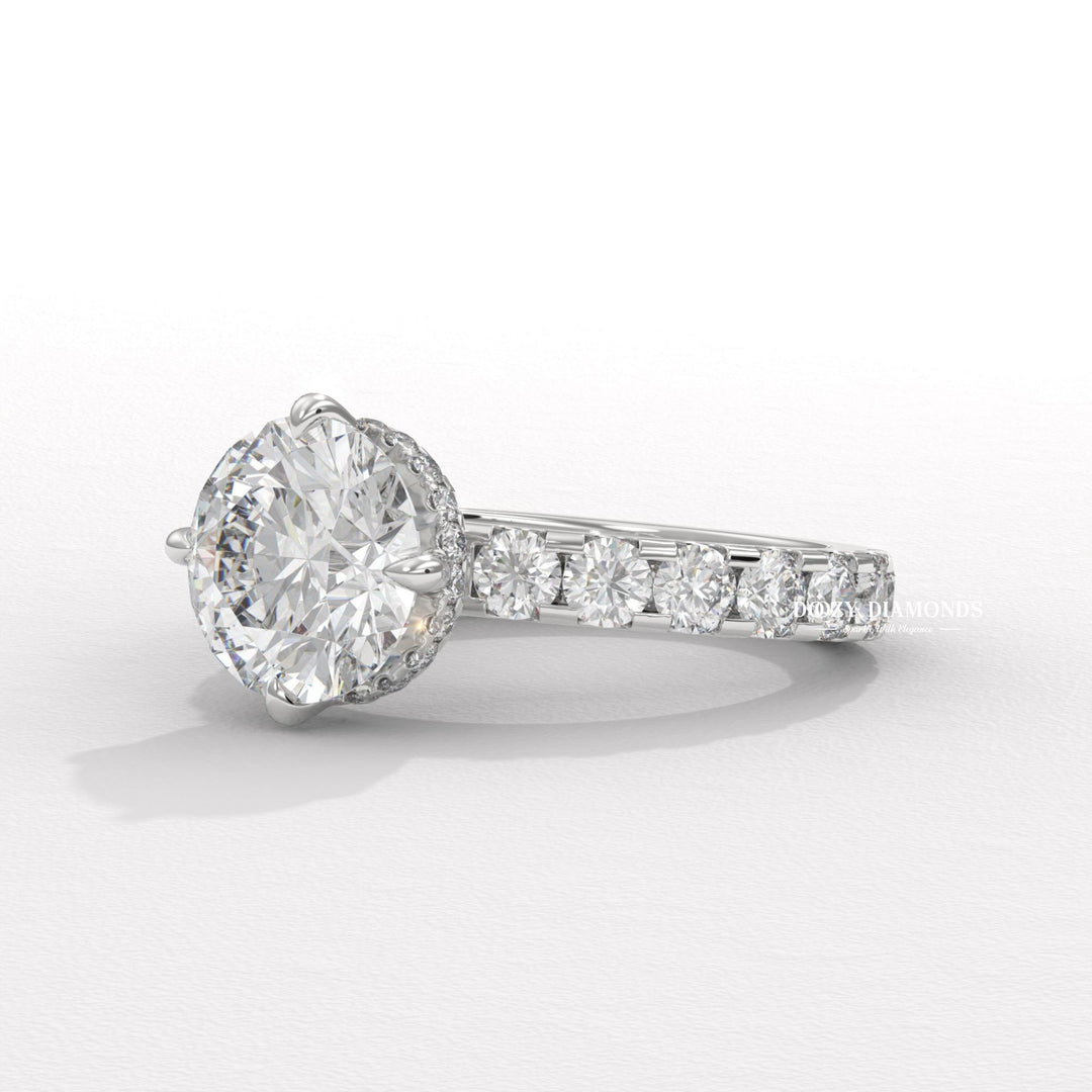 Round cut hidden halo engagement ring shown in real-life wear