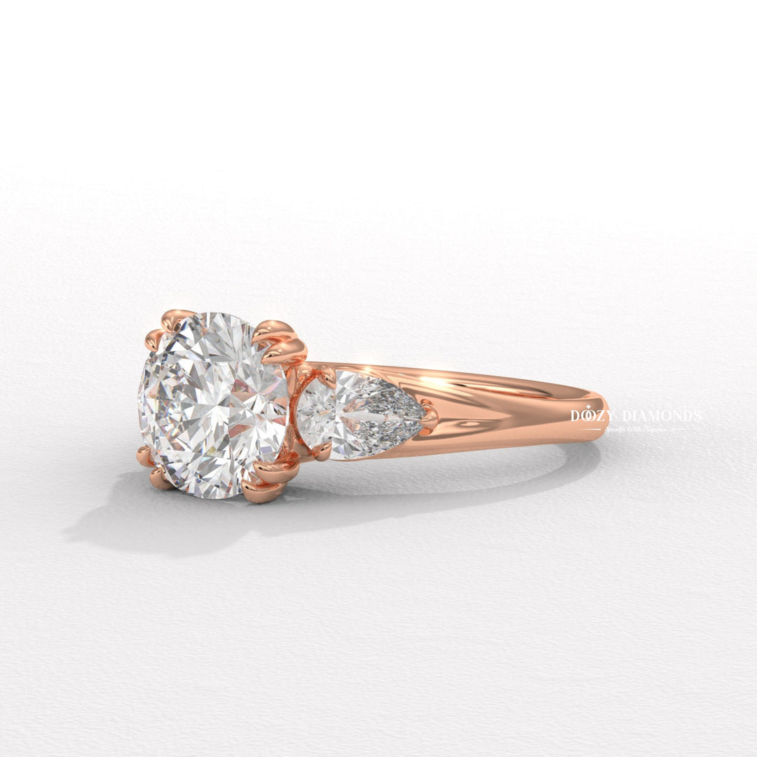 Lifestyle shot of round three stone diamond ring on hand