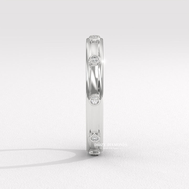 Side view of round diamond wedding band
