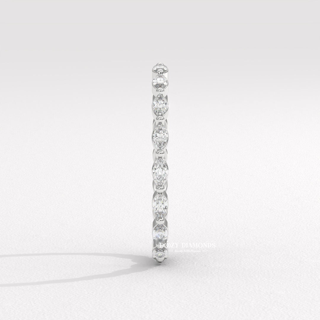 Side view of marquise diamond wedding band
