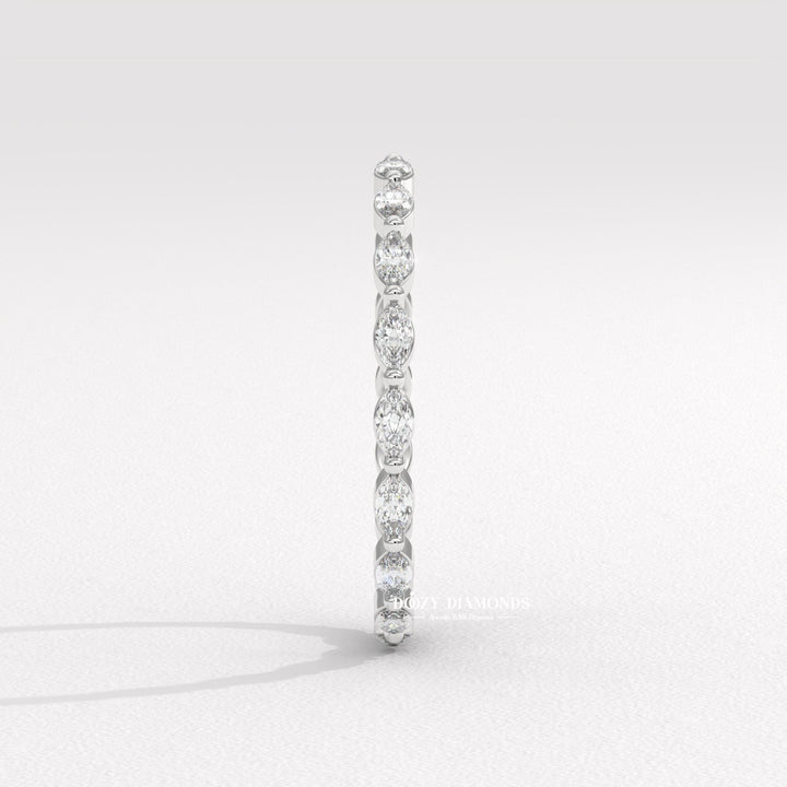 Side view of marquise diamond wedding band