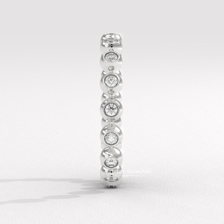 Side view of round diamond wedding band