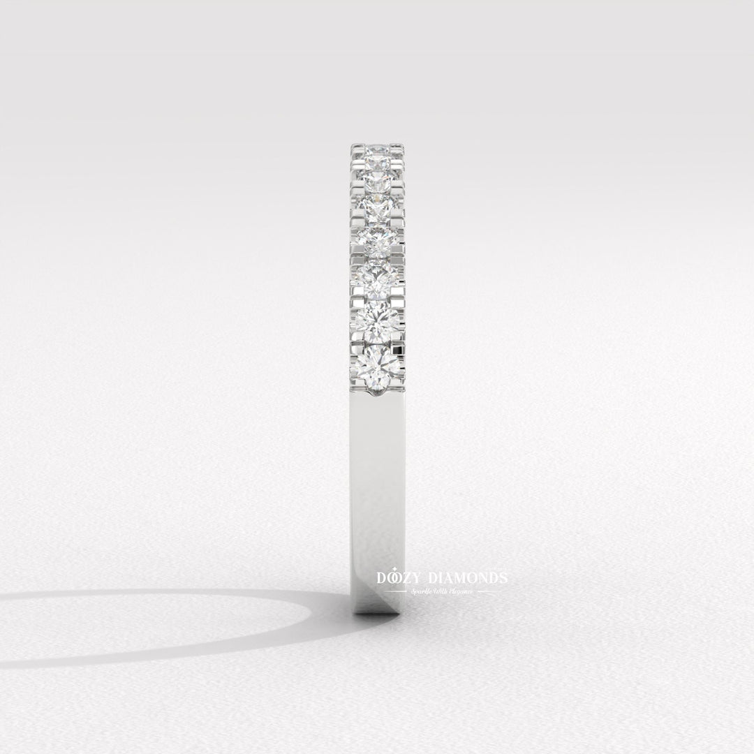Side view of round diamond wedding band