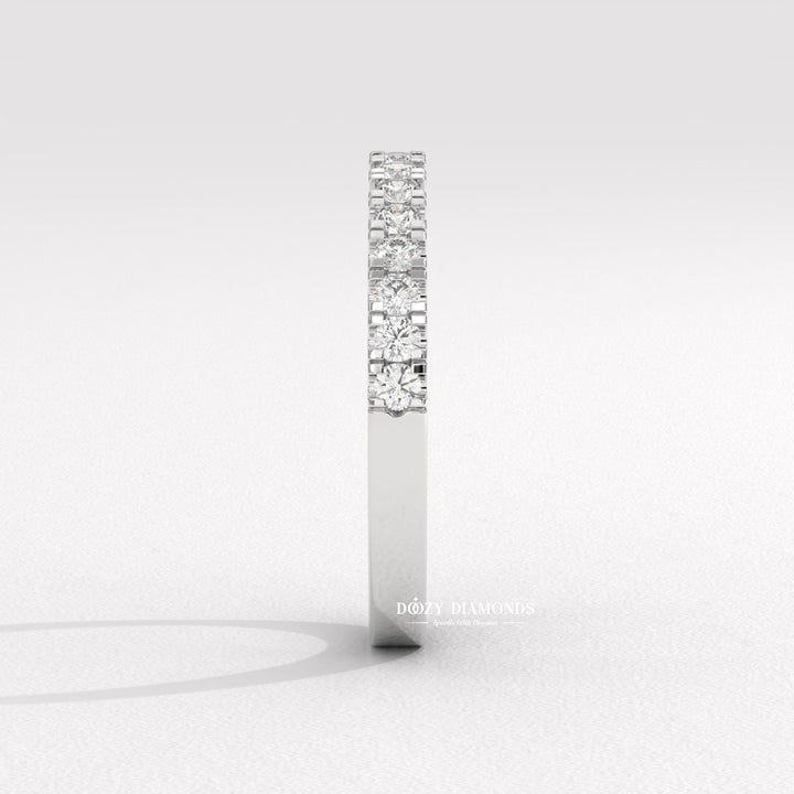 Side view of round diamond wedding band