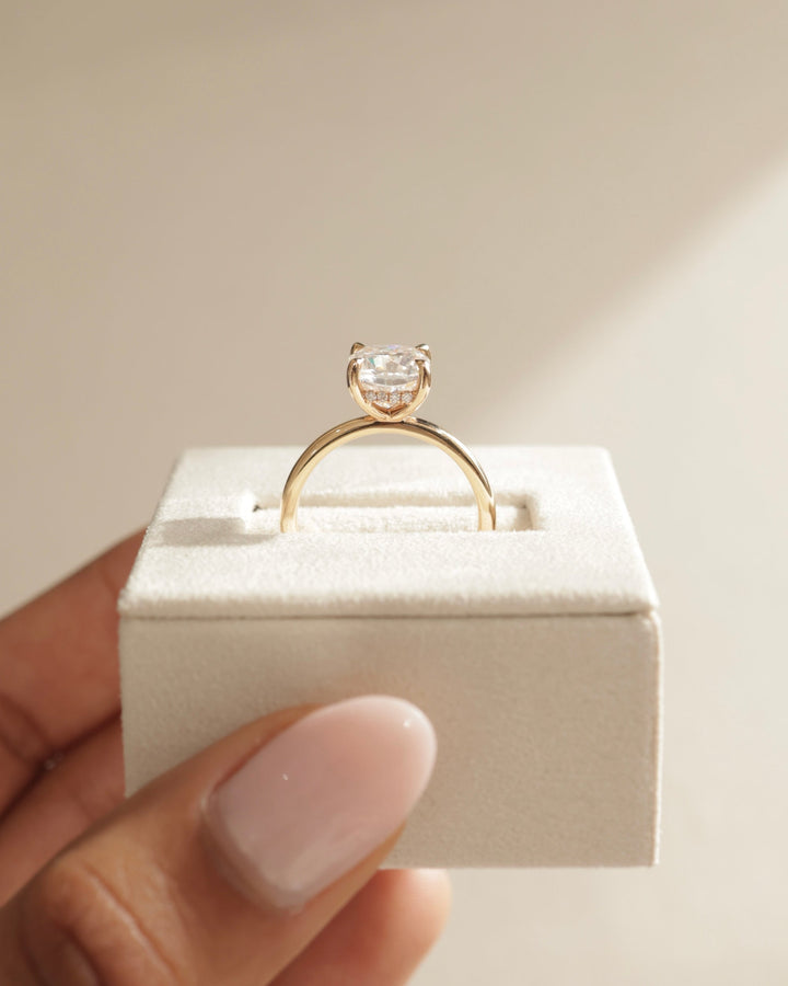 Cushion hidden halo engagement ring with brilliant diamond sparkle