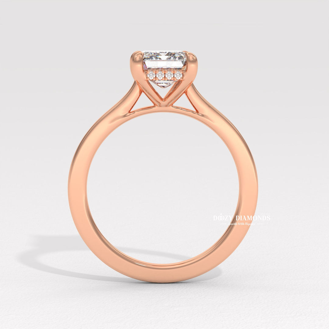Unboxing view of emerald cut hidden halo diamond engagement ring