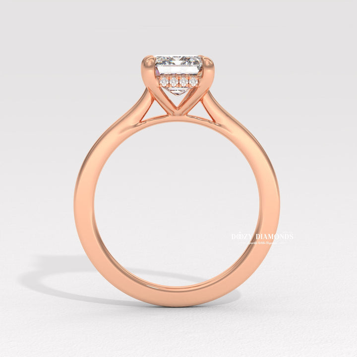 Unboxing view of emerald cut hidden halo diamond engagement ring